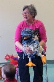 Jan with Mother Goose on the first day of her first program at Chizuk Amuno